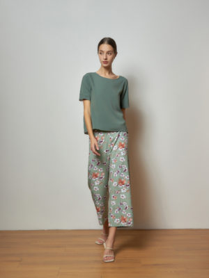 Reversible Signature Pants with green floral prints and light green