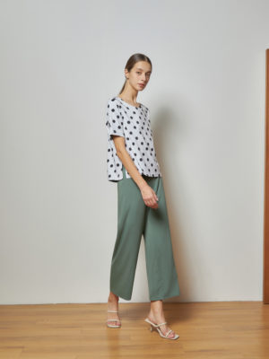 Reversible Signature Pants with green floral prints and light green (reverse side)