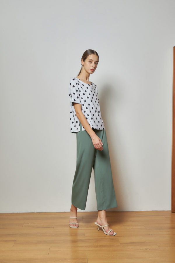 Reversible Signature Pants with green floral prints and light green (reverse side)