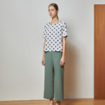 Reversible Signature Pants with green floral prints and light green