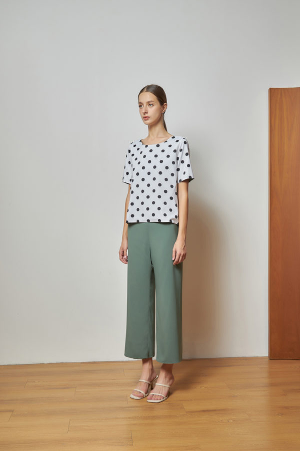 Reversible Signature Pants with green floral prints and light green