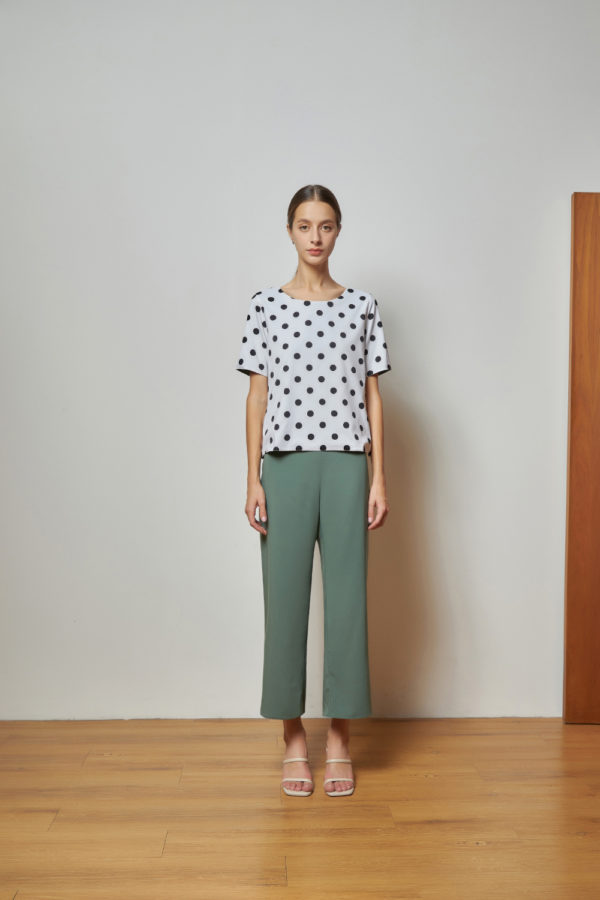 Reversible Signature Pants with green floral prints and light green