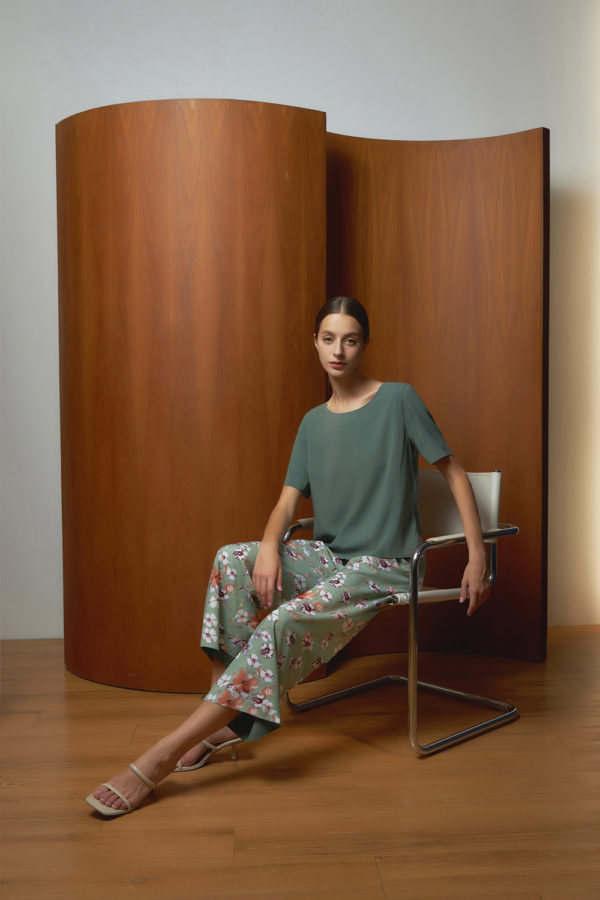 Reversible Signature Pants with green floral prints and light green