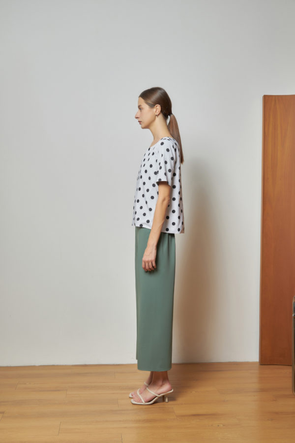 Reversible Signature Pants with green floral prints and light green