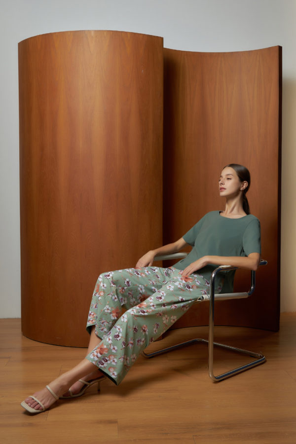 Reversible Signature Pants with green floral prints and light green